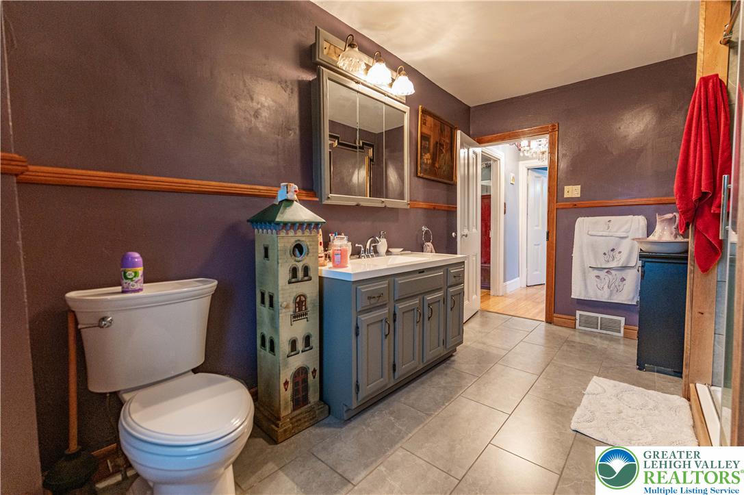 2485 Hieter Road Quakertown, PA 18951 - Photo 45 of 97 A well-appointed bathroom offers a vanity with ample storage and a private water closet.