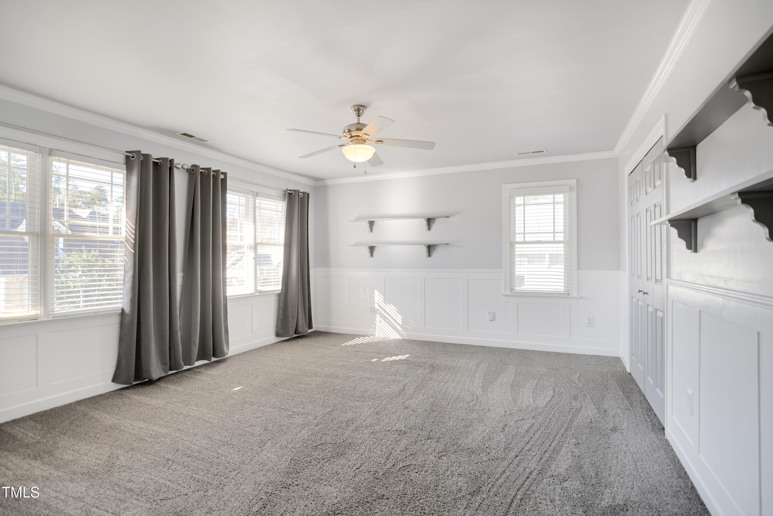 121 Homegate Circle Apex, NC 27502 - Photo 21 of 33 a view of an empty room with a window