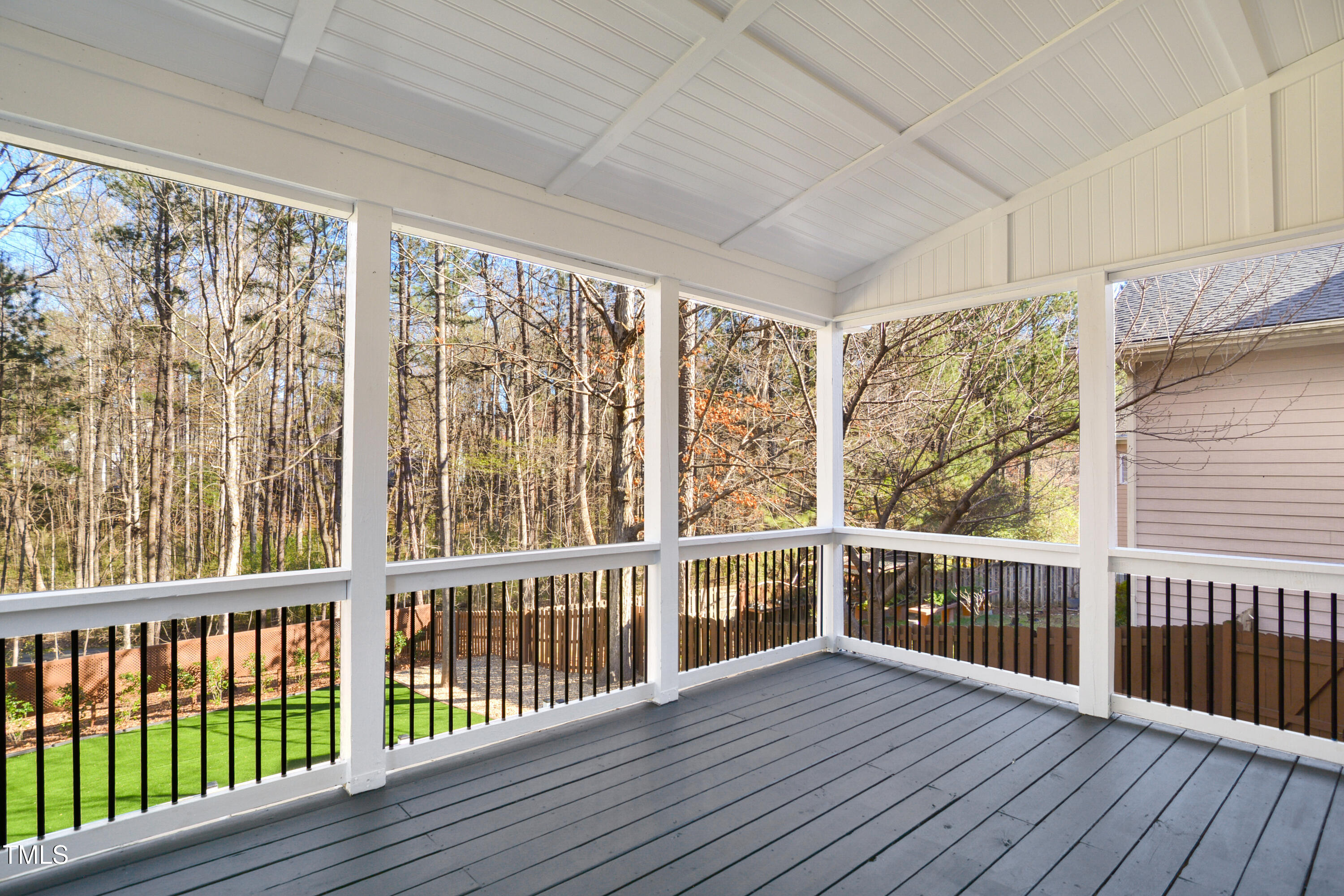 121 Homegate Circle Apex, NC 27502 - Photo 26 of 33 a view of a wooden balcony with wooden floor