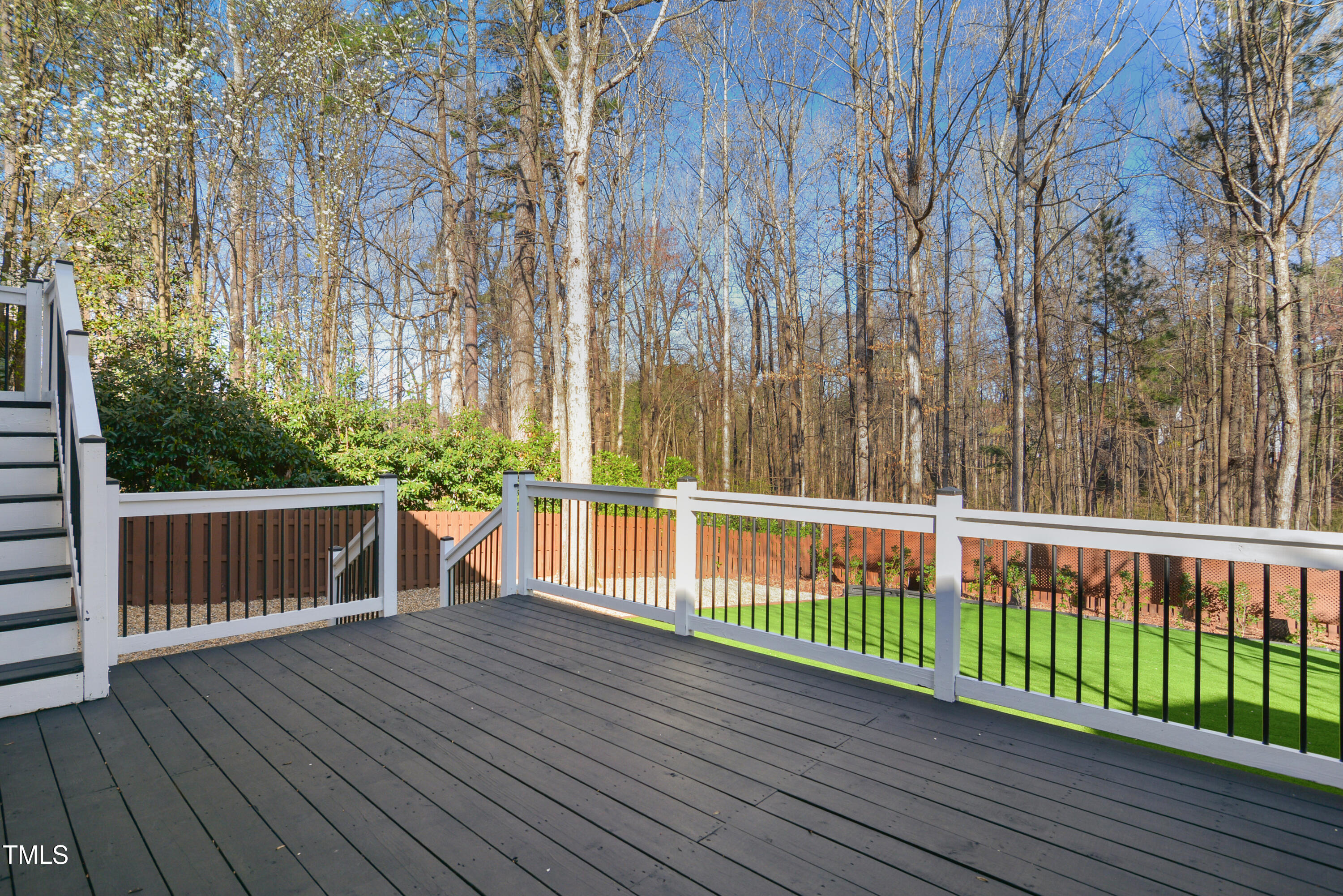 121 Homegate Circle Apex, NC 27502 - Photo 30 of 33 a view of deck with wooden floor and fence
