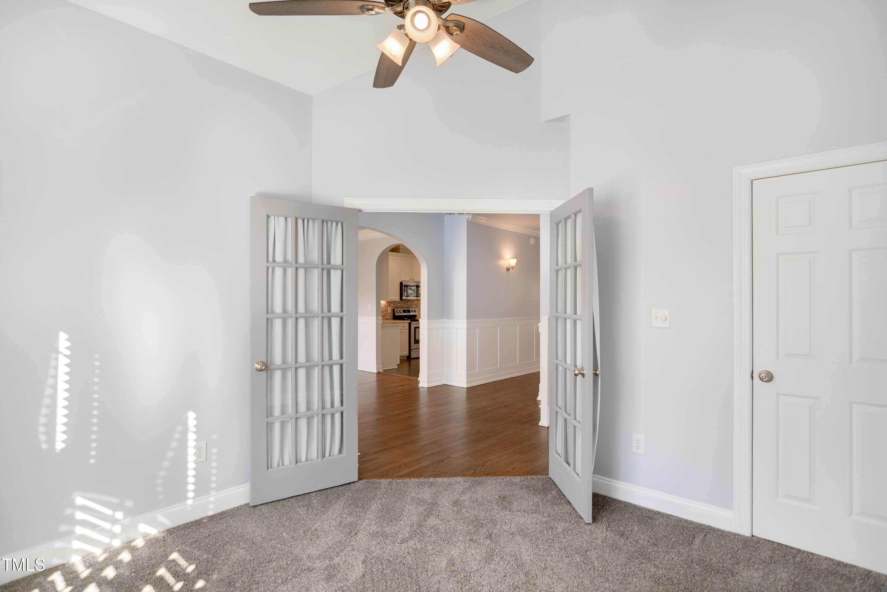 121 Homegate Circle Apex, NC 27502 - Photo 6 of 33 wooden floor in an empty room with a window