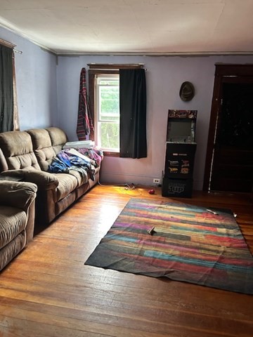 59-61 Conway Street Greenfield, MA 01301 - Photo 9 of 10 a bedroom with a bed and a window