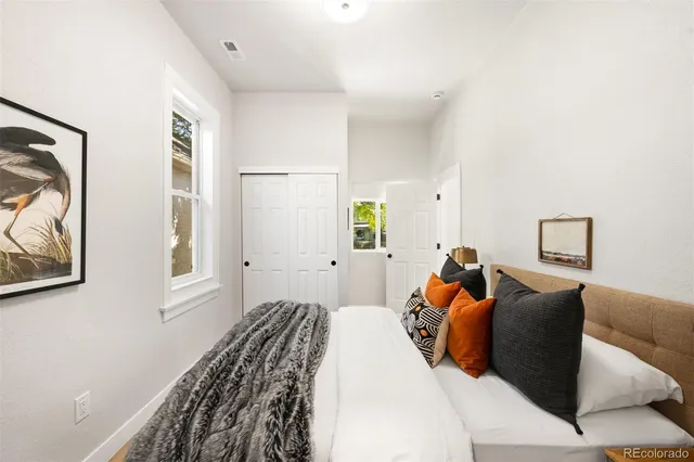 a bathroom with sinks a mirror and vanity
