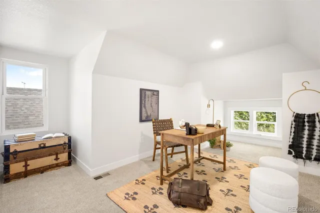 a view of a front of house with a yard