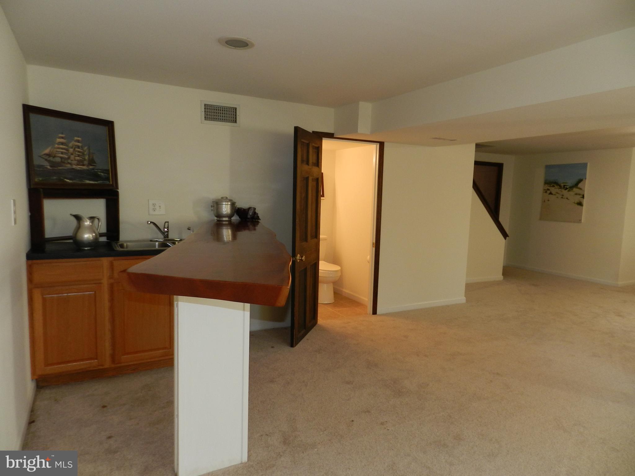 722 Hillview Road Malvern, PA 19355 - Photo 27 of 49 Custom wood topped Wetbar in Lower level