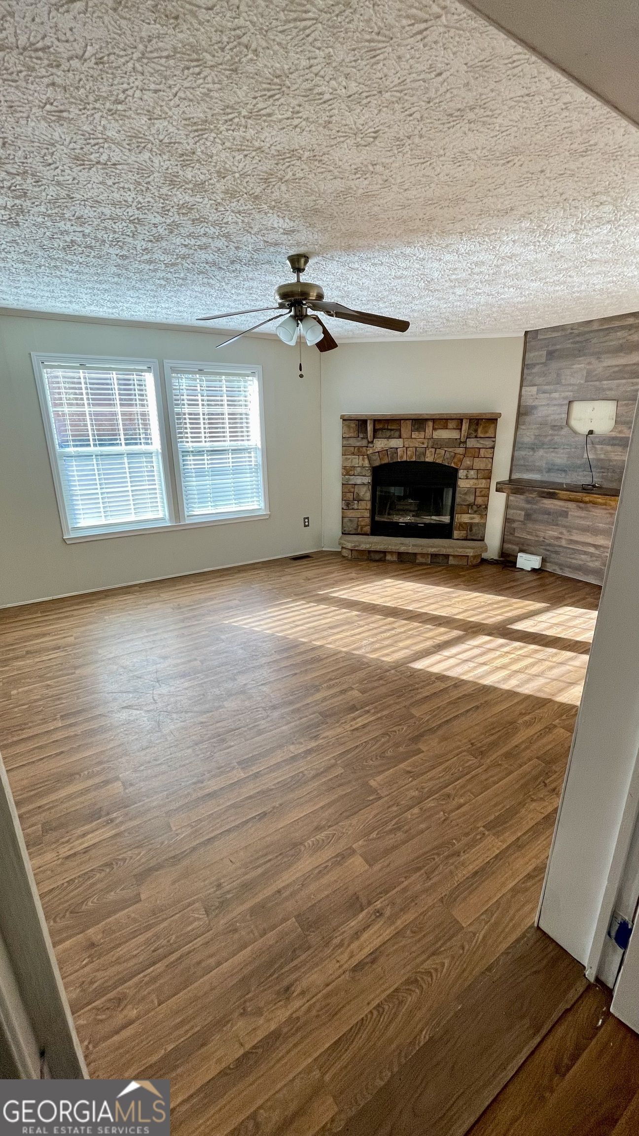 21 Ruby Road Hawkinsville, GA 31036 - Photo 11 of 43 a view of an empty room with a fireplace