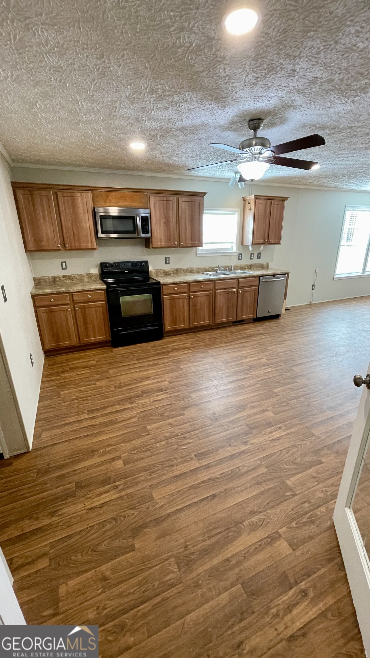 21 Ruby Road Hawkinsville, GA 31036 - Photo 16 of 43 a view of kitchen with wooden floor