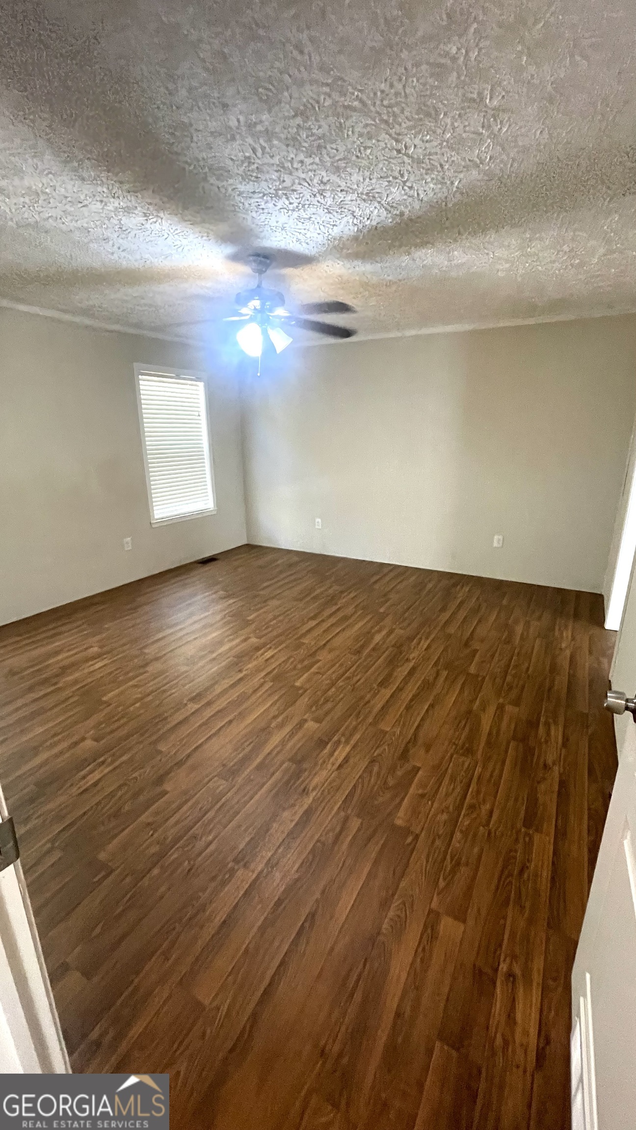 21 Ruby Road Hawkinsville, GA 31036 - Photo 28 of 43 a view of empty room with wooden floor