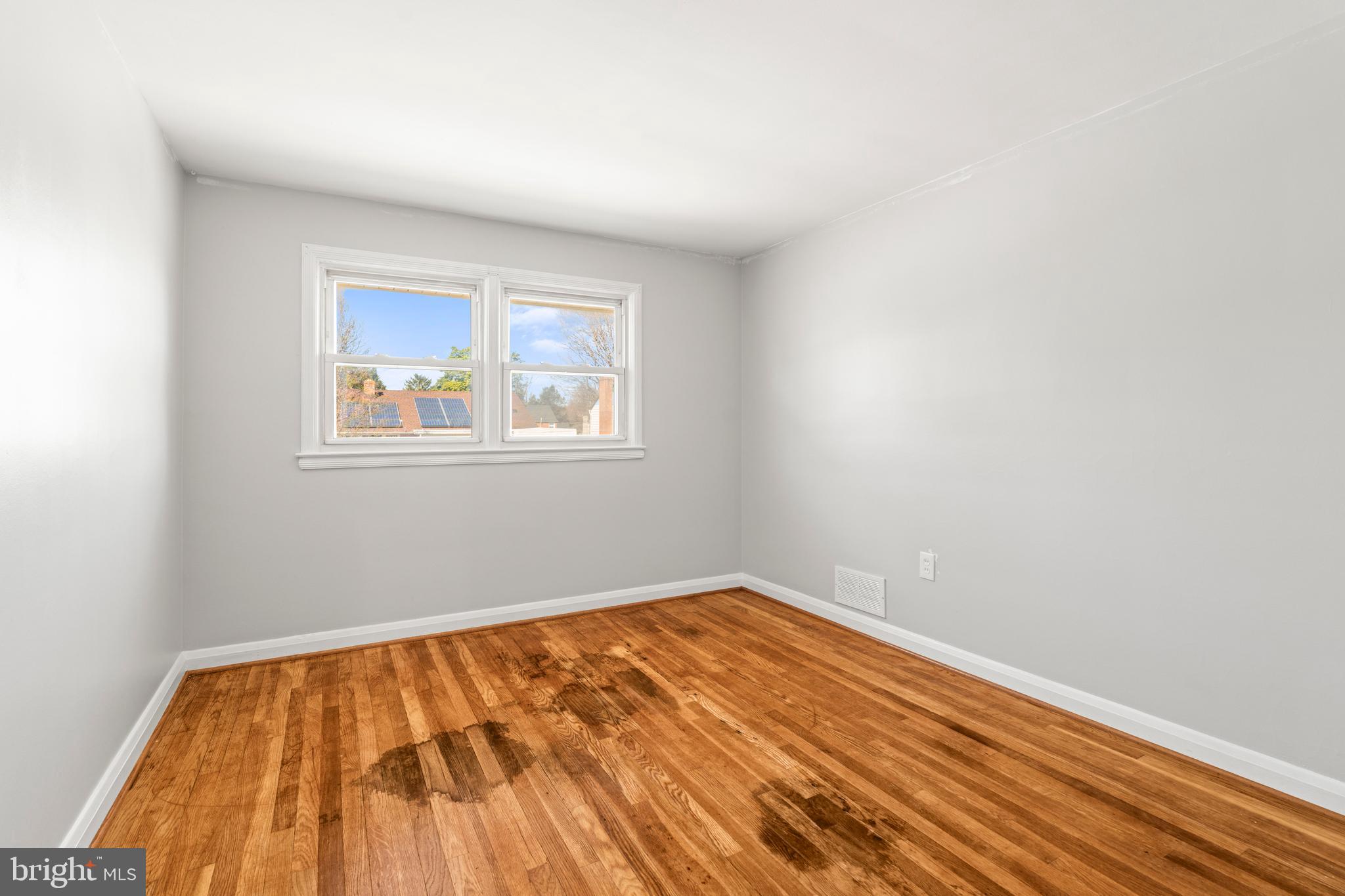 1407 Shefford Road Baltimore, MD 21239 - Photo 20 of 35 wooden floor in a room