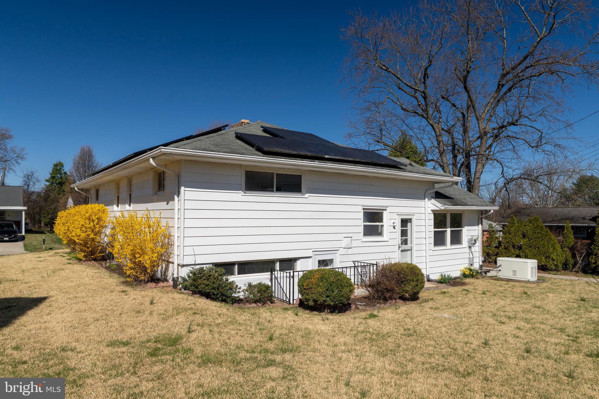 1407 Shefford Road Baltimore, MD 21239 - Photo 29 of 35 a view of a house with a snow in the yard