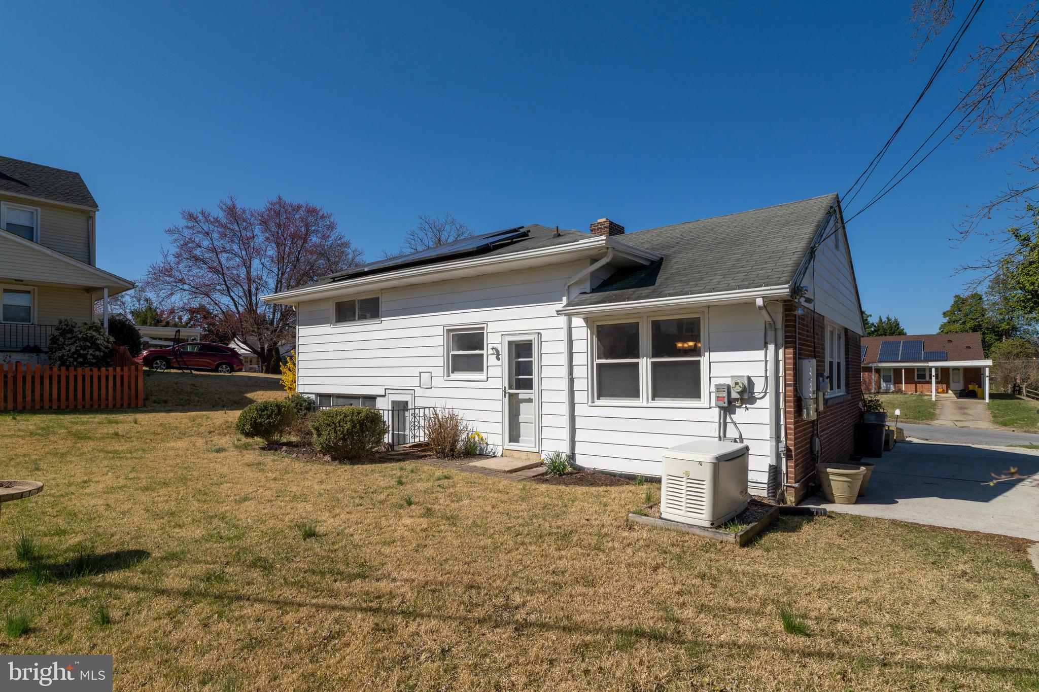 1407 Shefford Road Baltimore, MD 21239 - Photo 31 of 35 a view of house with a yard