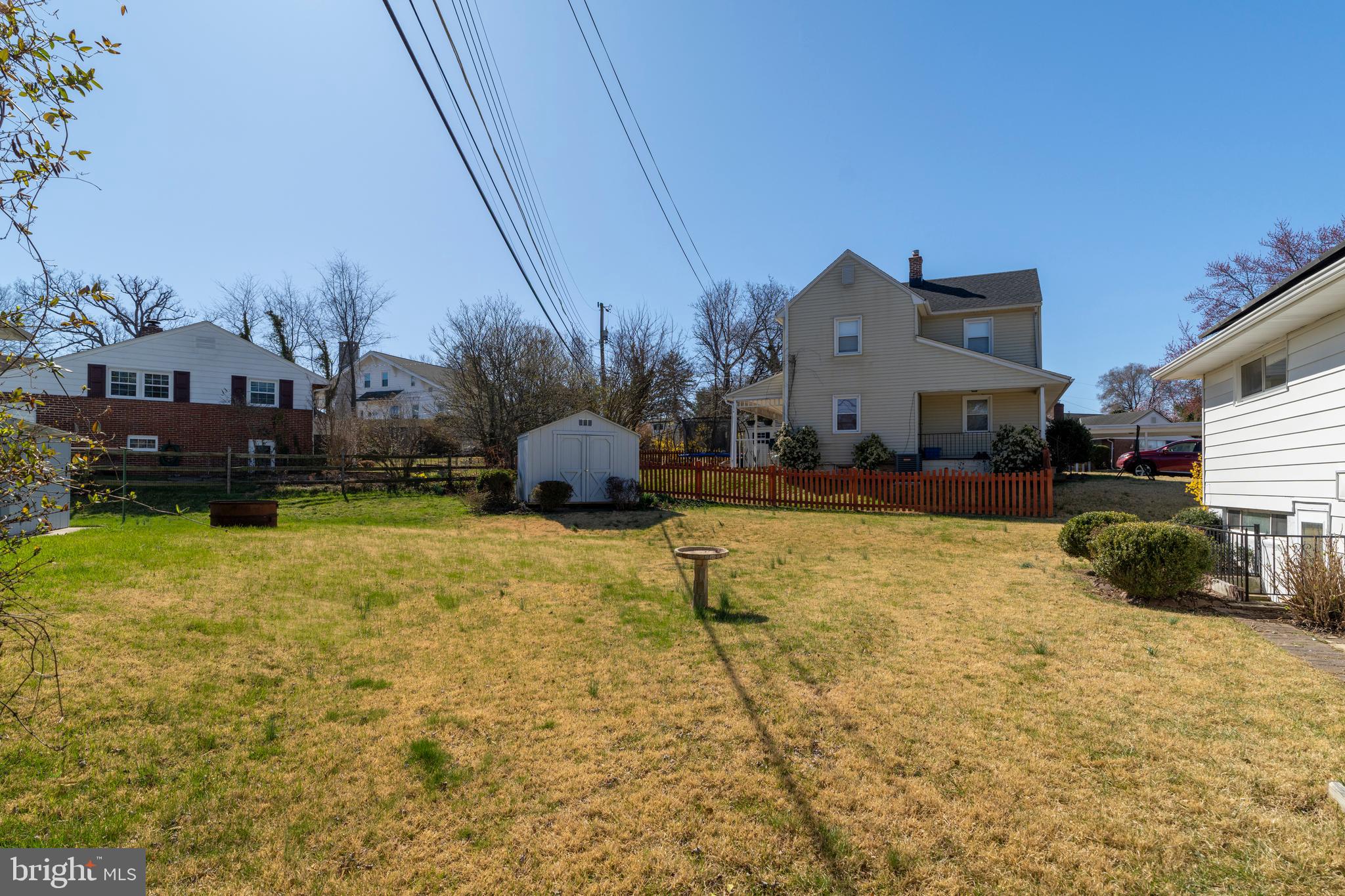 1407 Shefford Road Baltimore, MD 21239 - Photo 32 of 35 a view of a house with a yard