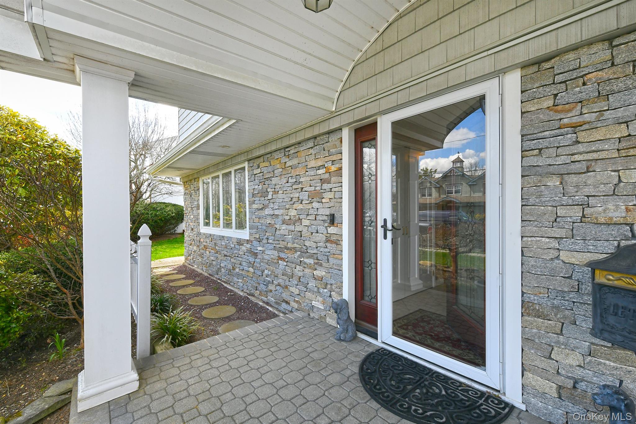1968 Cynthia Lane Merrick, NY 11566 - Photo 3 of 32 a view of a entryway door of the house
