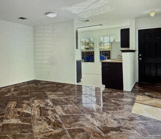 a bedroom with a bed and a television in it