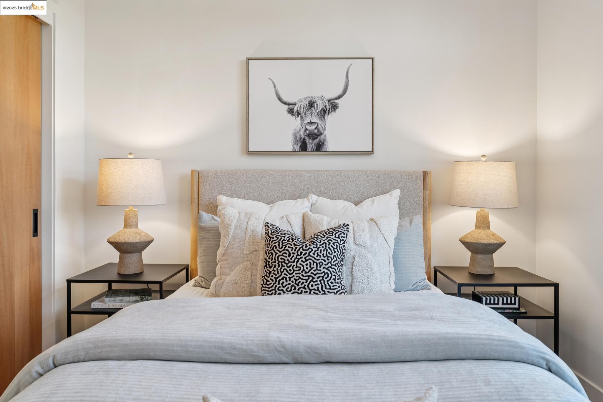 1516 A Blake Street Berkeley, CA 94703 - Photo 41 of 55 a bedroom with a bed and lamp