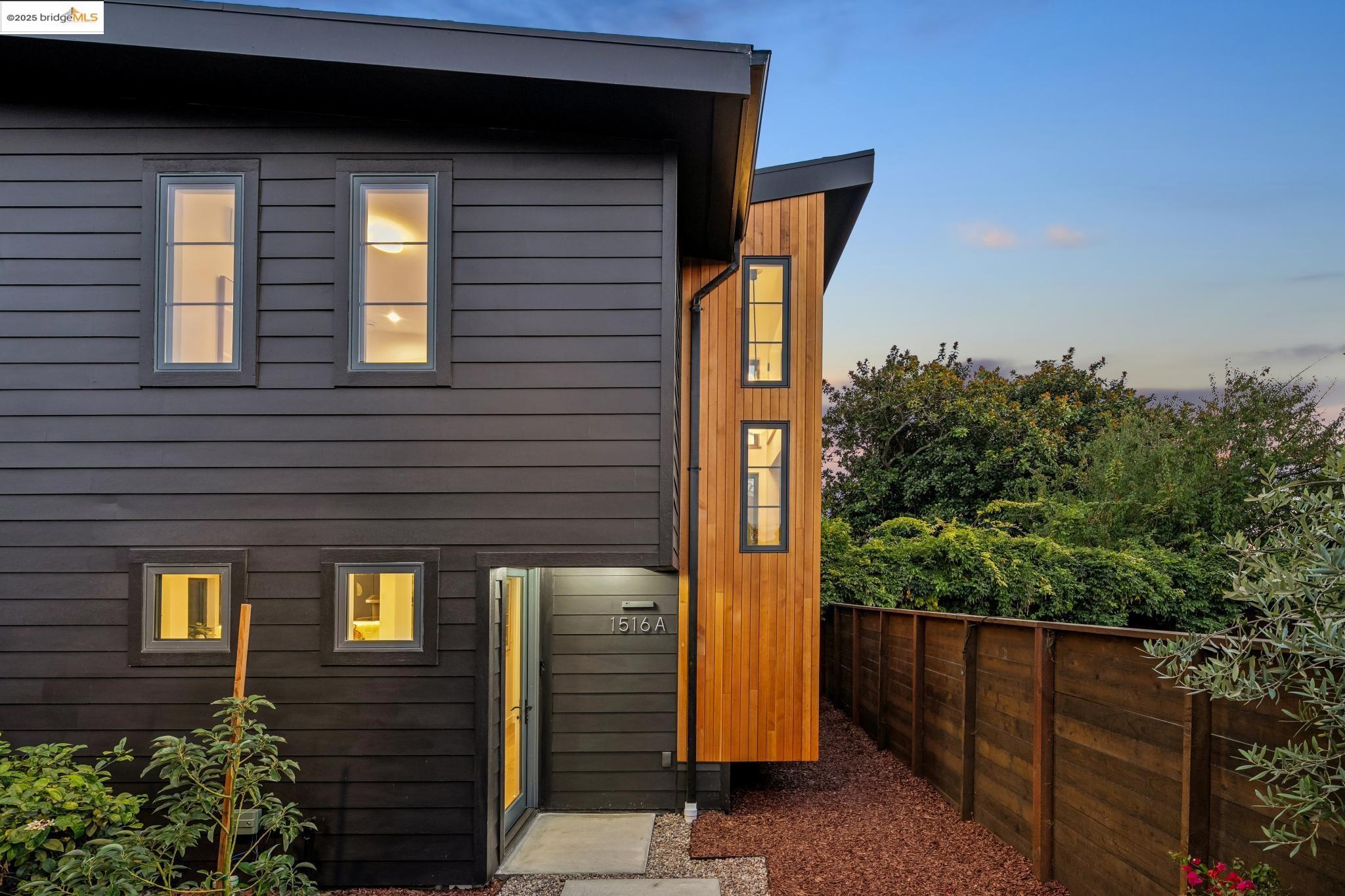 1516 A Blake Street Berkeley, CA 94703 - Photo 47 of 55 a front view of a house with trees