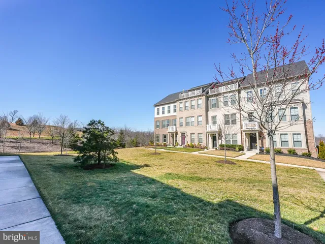a view of an apartment with a garden
