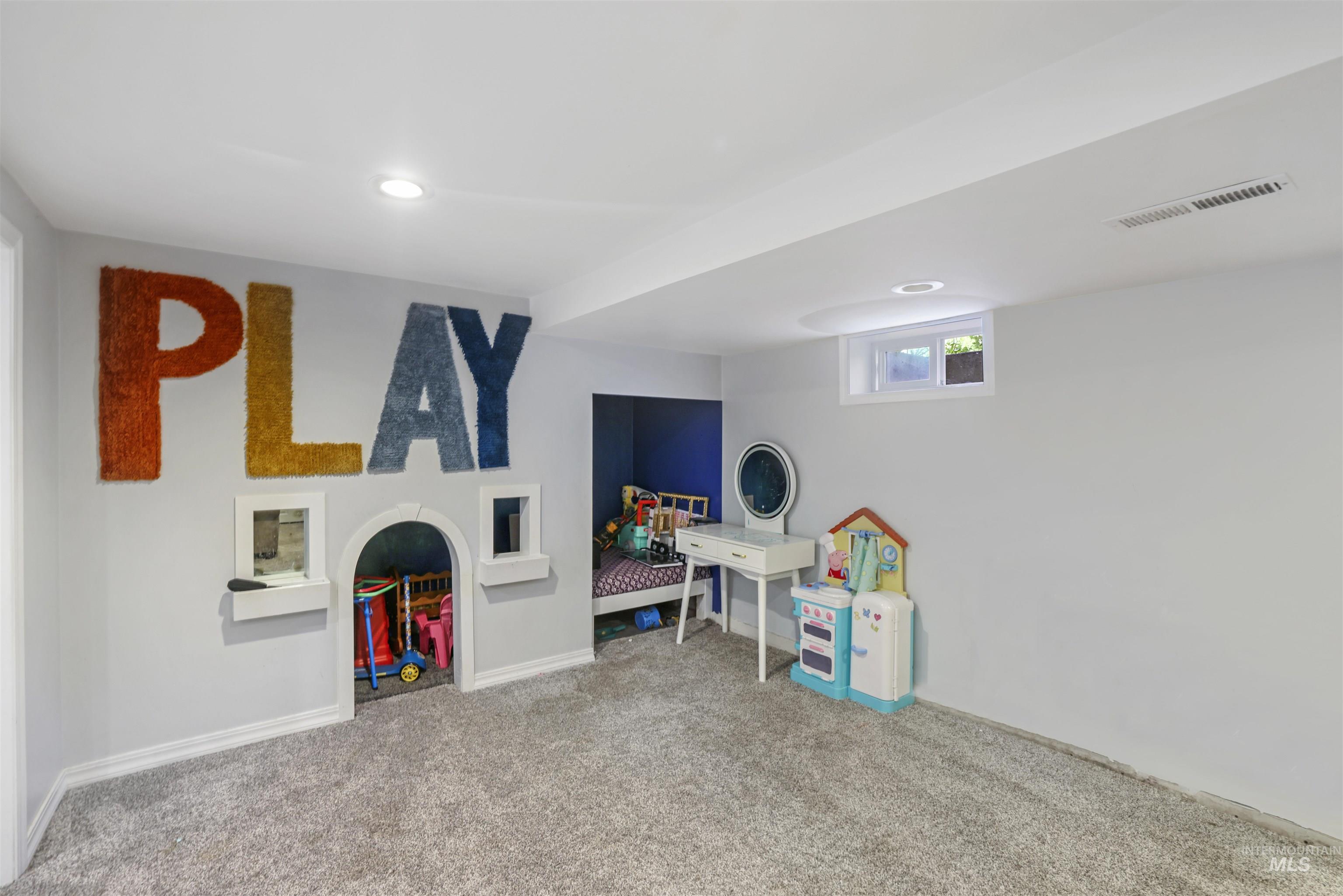 201 West 19th Street Burley, ID 83318 - Photo 16 of 31 Playroom featuring carpet floors and recessed lighting