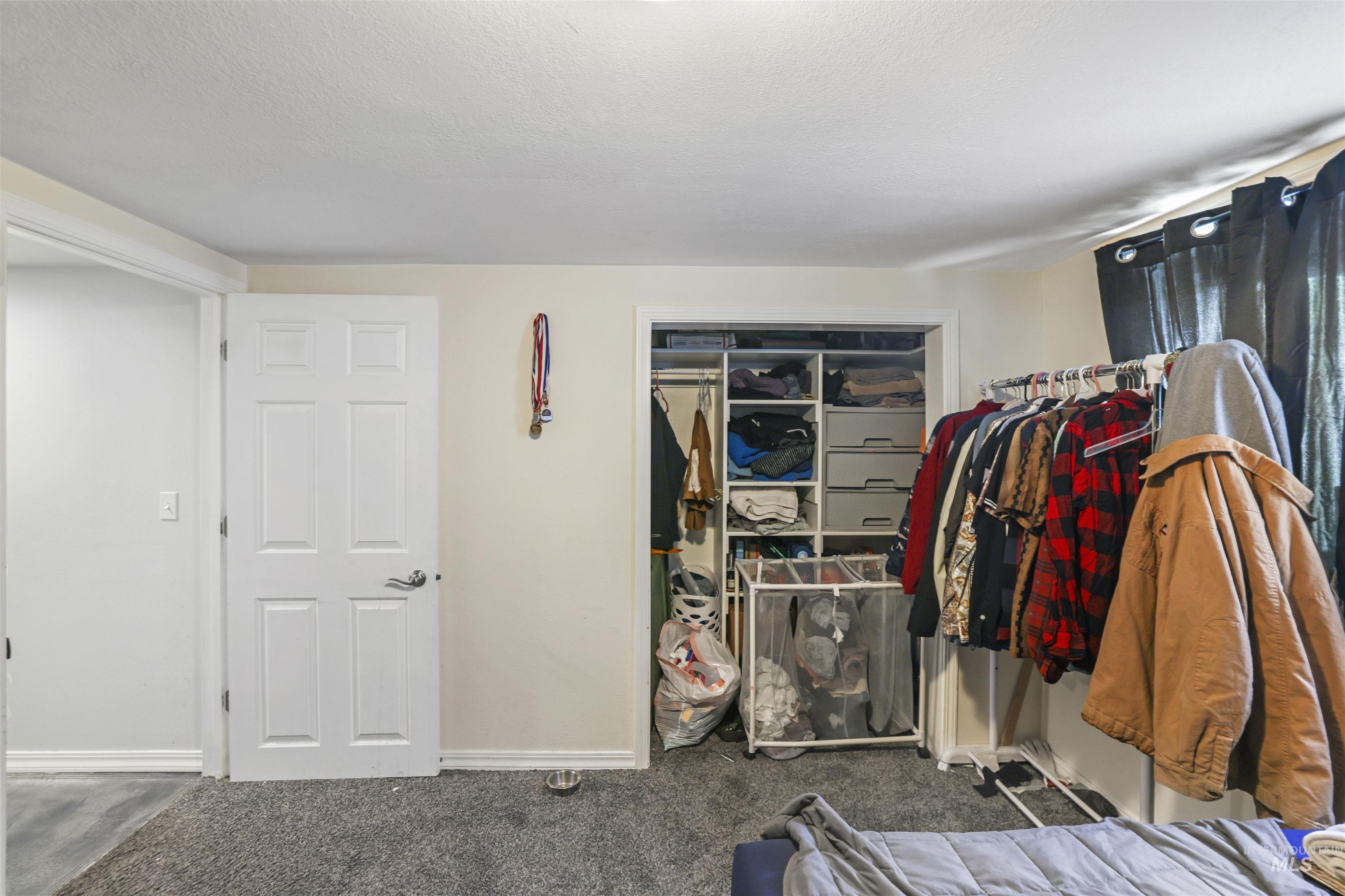 201 West 19th Street Burley, ID 83318 - Photo 18 of 31 Spacious closet with carpet