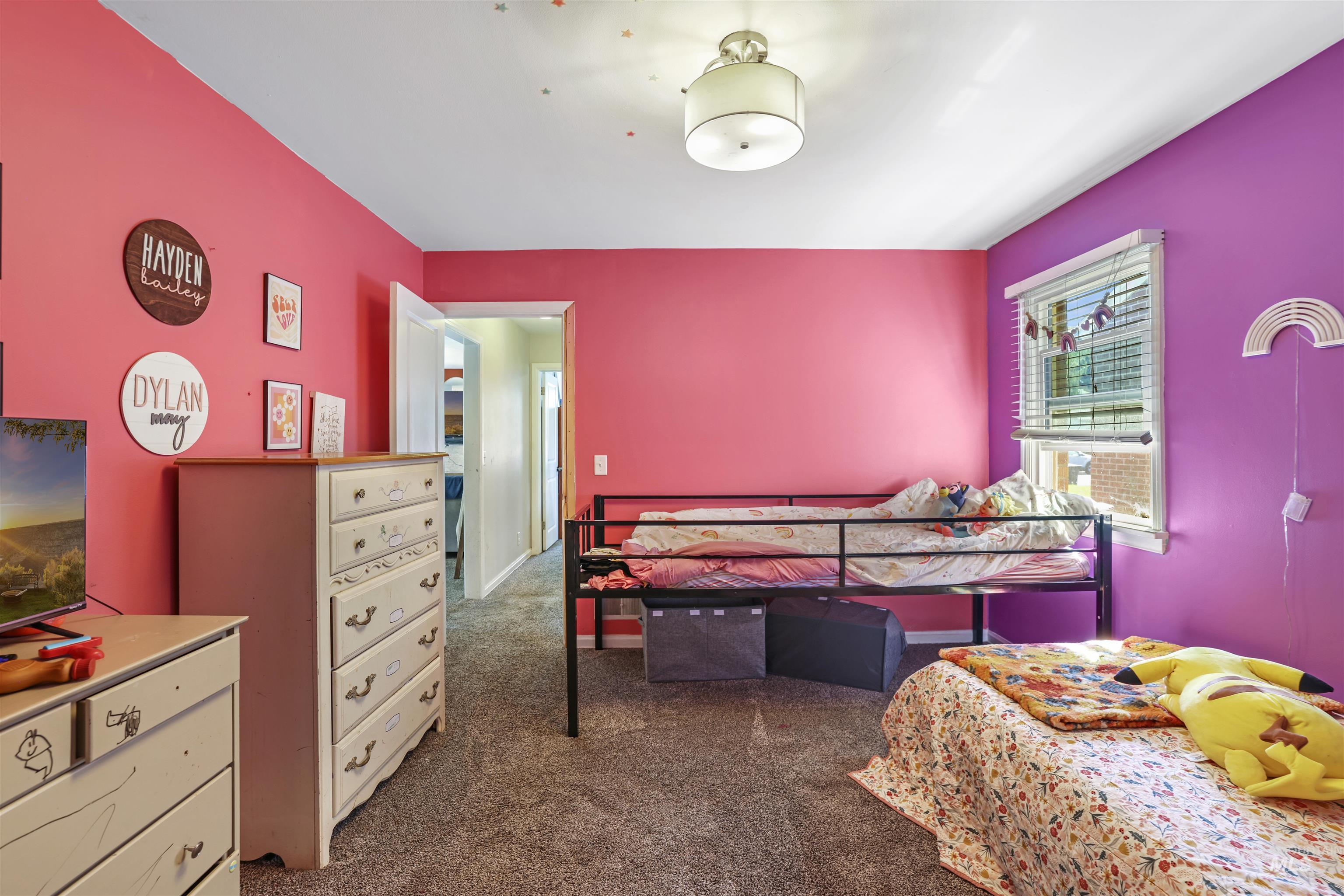 201 West 19th Street Burley, ID 83318 - Photo 20 of 31 Bedroom featuring dark colored carpet