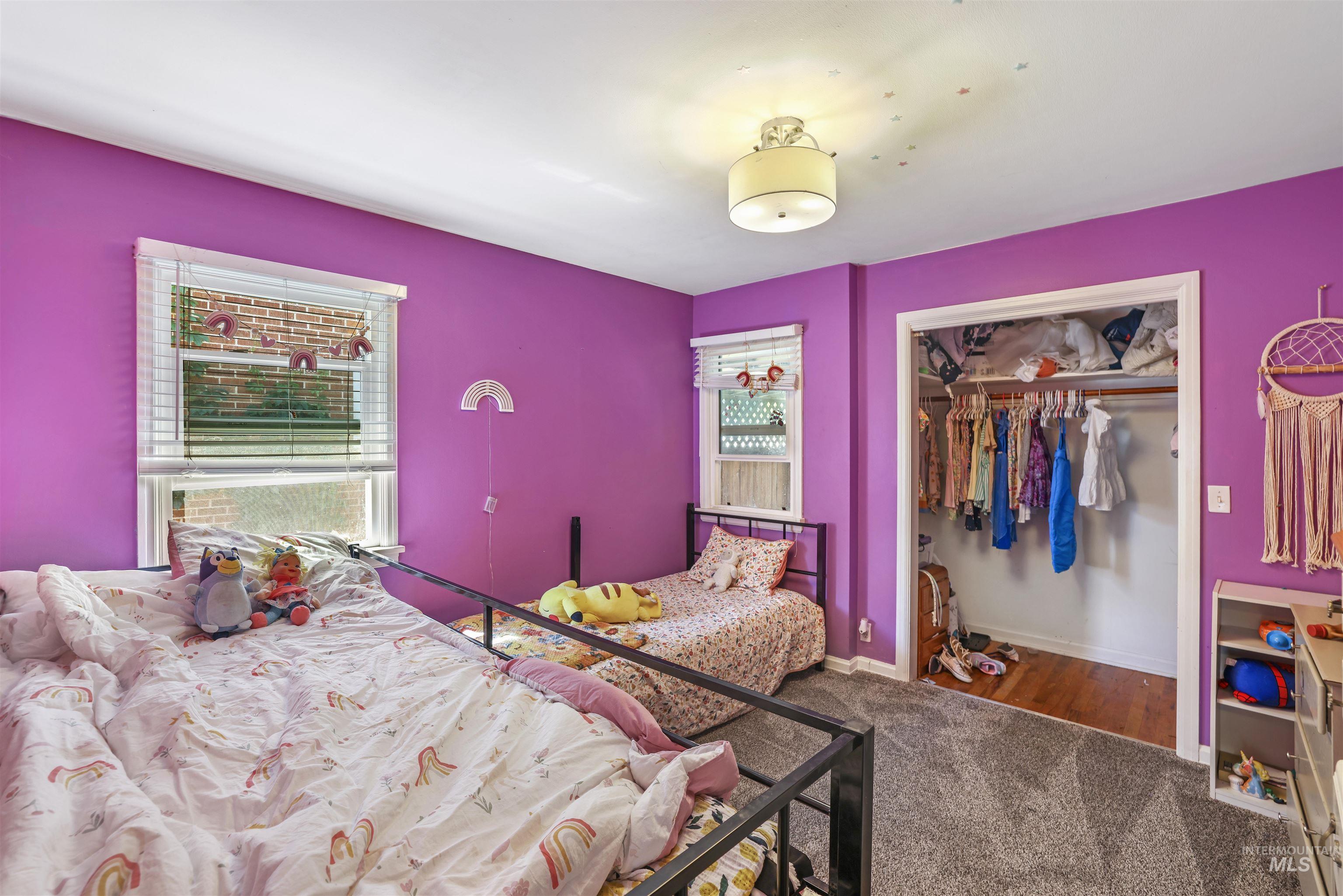 201 West 19th Street Burley, ID 83318 - Photo 21 of 31 Carpeted bedroom with a closet and baseboards