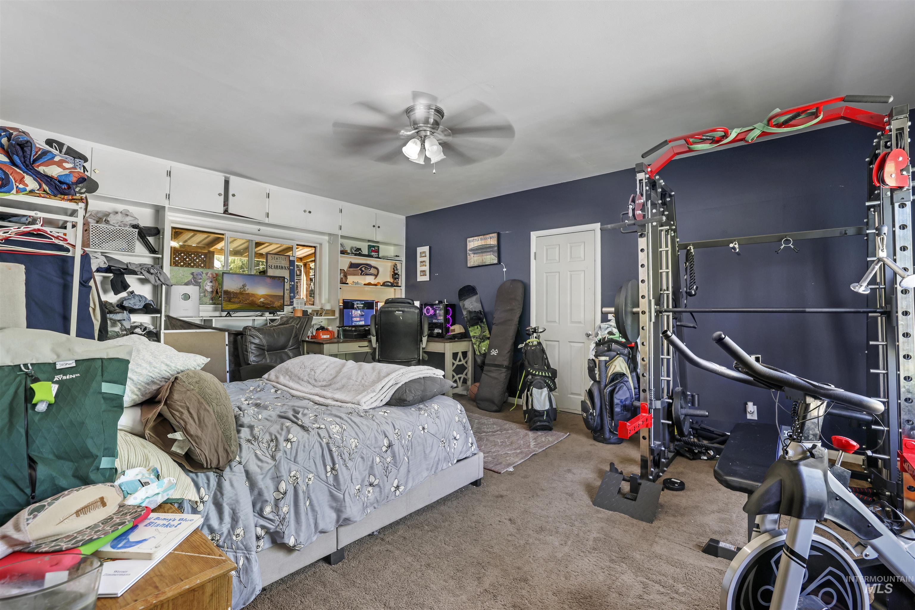 201 West 19th Street Burley, ID 83318 - Photo 25 of 31 Carpeted bedroom with ceiling fan
