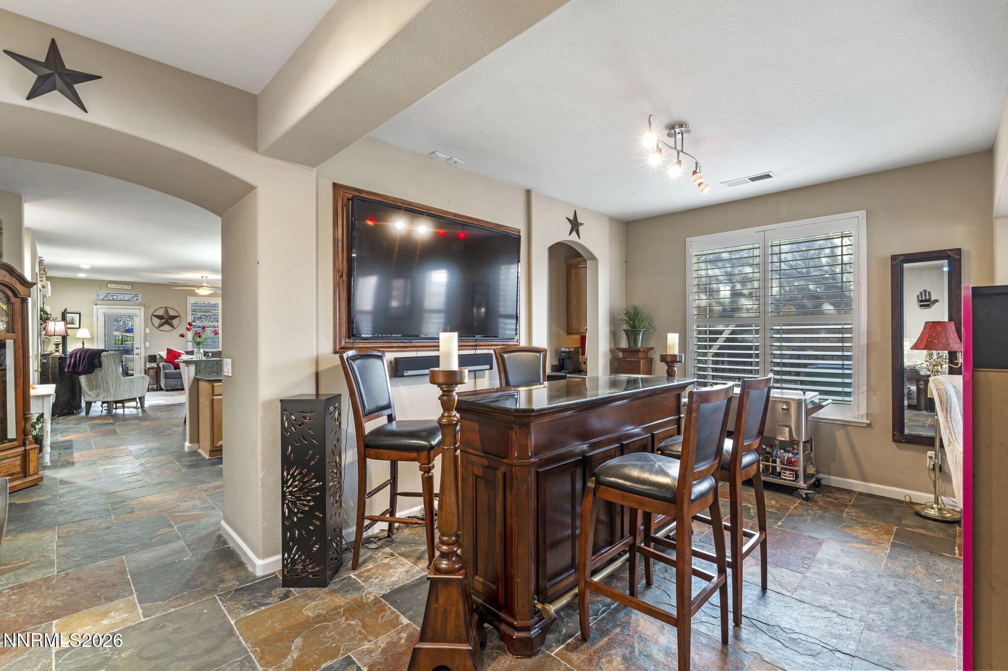 3239 Banestone Road Sparks, NV 89436 - Photo 15 of 38 a view of a dining room with furniture and a livingroom