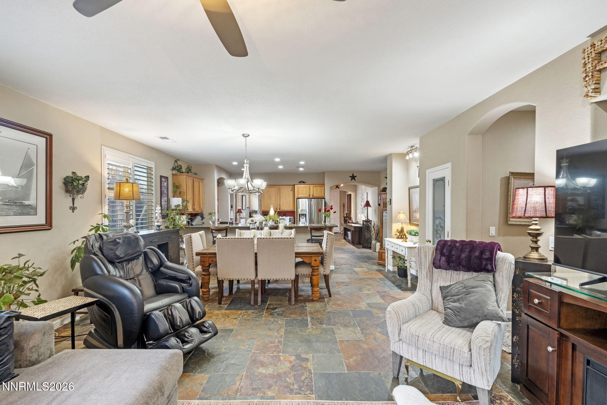3239 Banestone Road Sparks, NV 89436 - Photo 19 of 38 a living room with furniture and a flat screen tv