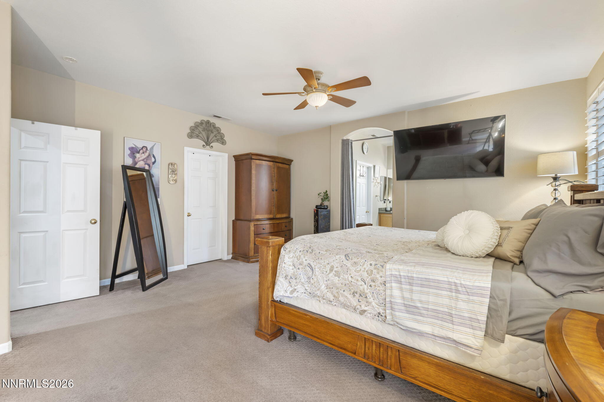 3239 Banestone Road Sparks, NV 89436 - Photo 27 of 38 a bedroom with a bed and a flat screen tv