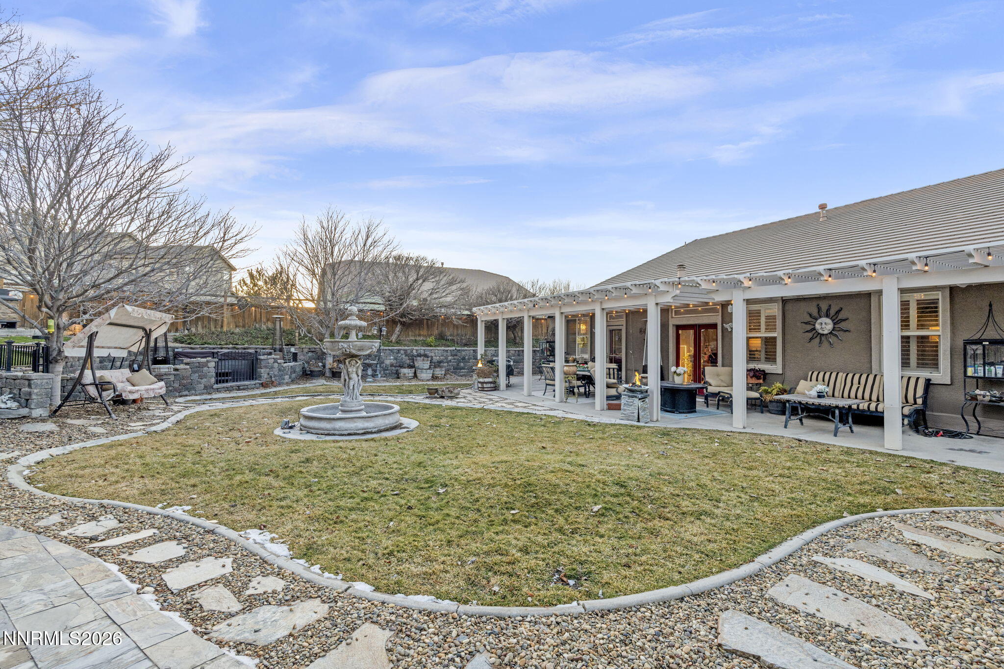 3239 Banestone Road Sparks, NV 89436 - Photo 34 of 38 a view of a house with swimming pool and sitting area