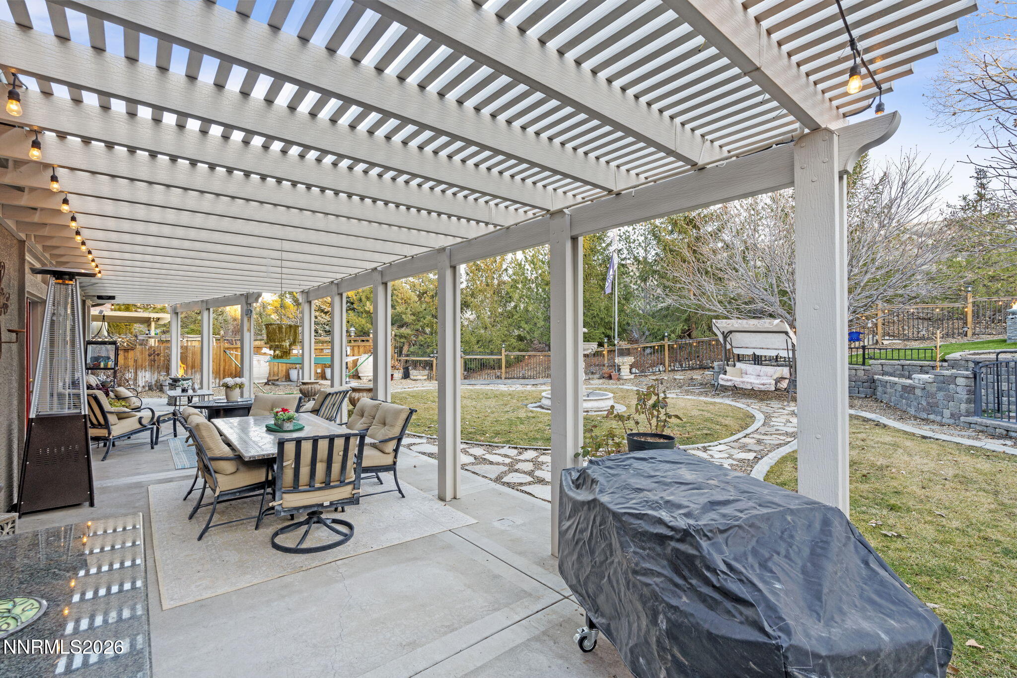 3239 Banestone Road Sparks, NV 89436 - Photo 35 of 38 a dining room with furniture water view and a large window