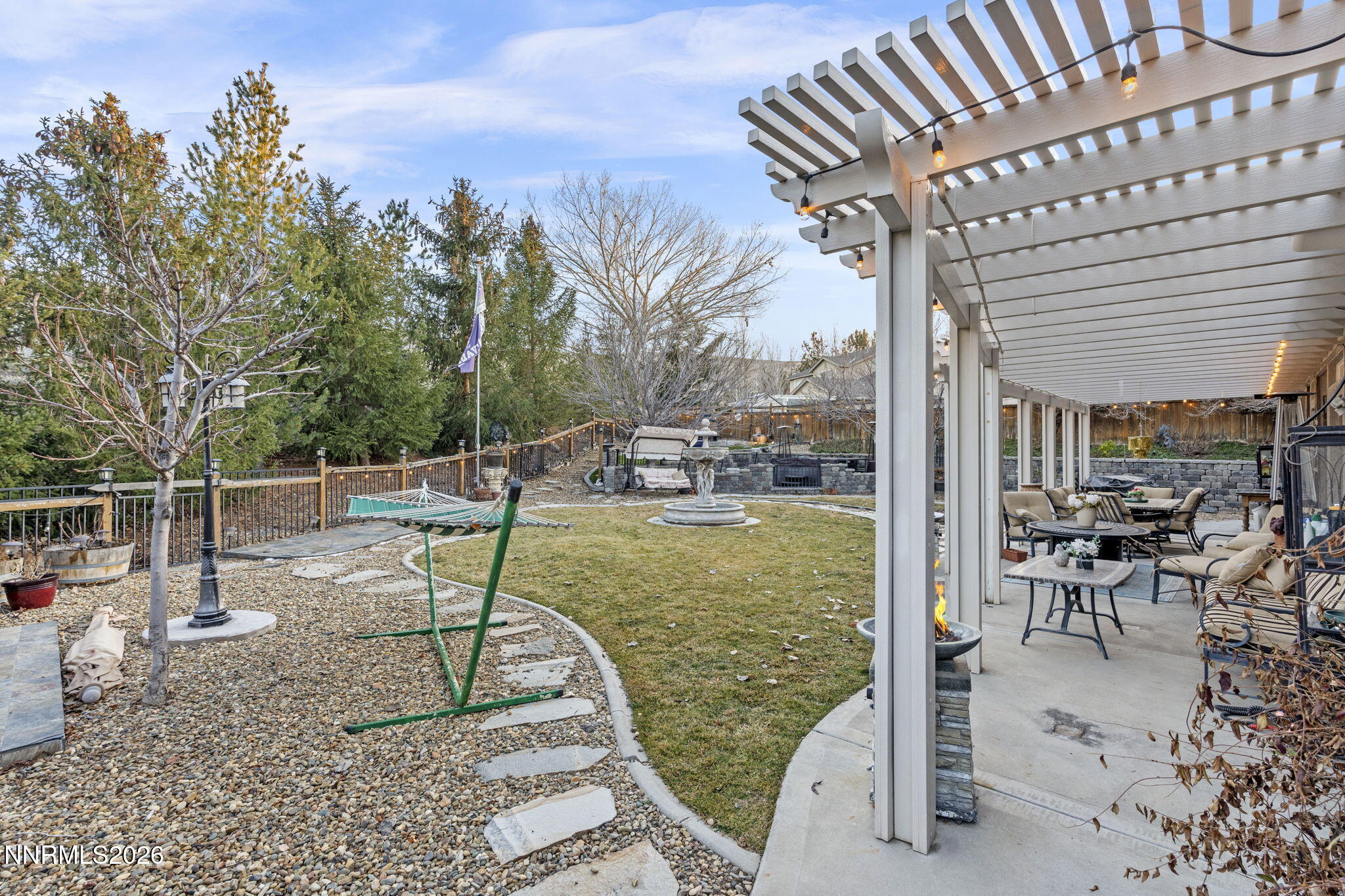 3239 Banestone Road Sparks, NV 89436 - Photo 36 of 38 a view of a swimming pool with chairs in patio