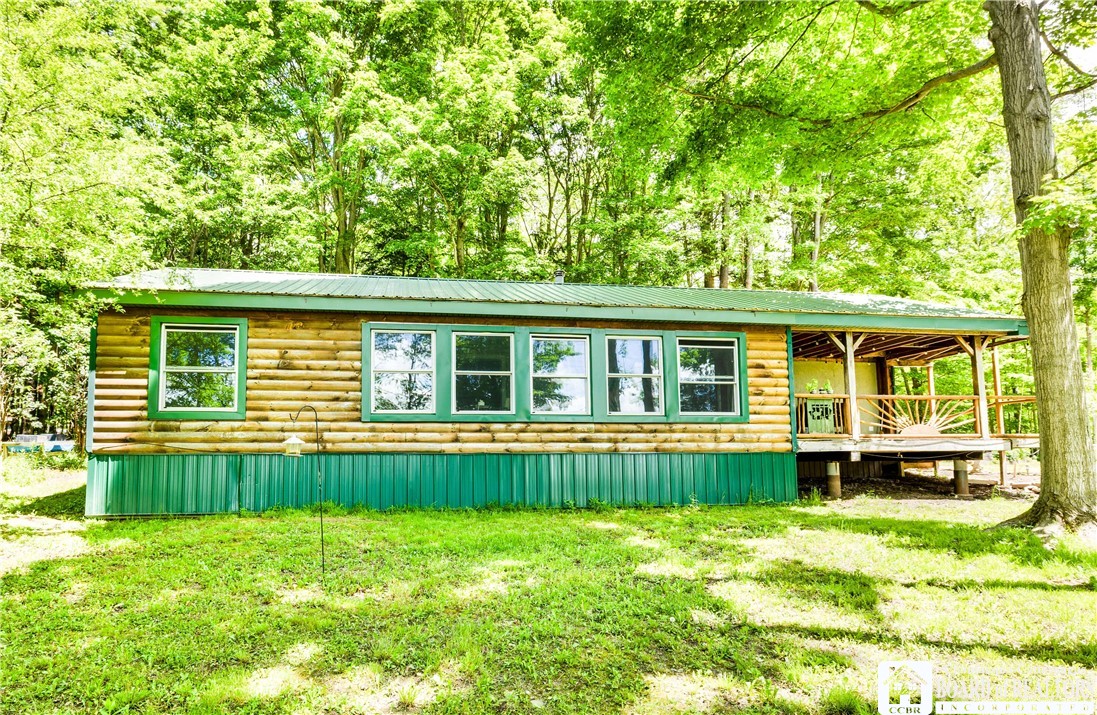 8961 Flucker Hill Road Villenova, NY 14138 - Photo 6 of 26 Front view of home w/porch