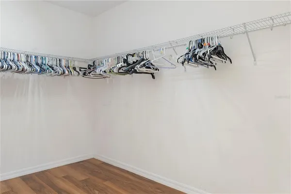 a view of a house with backyard porch and sitting area