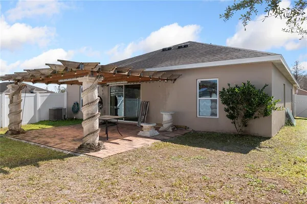 an aerial view of a house with a garden