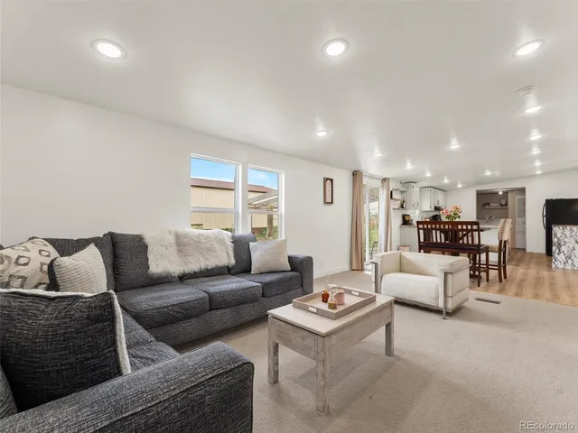 a living room with furniture and a couch