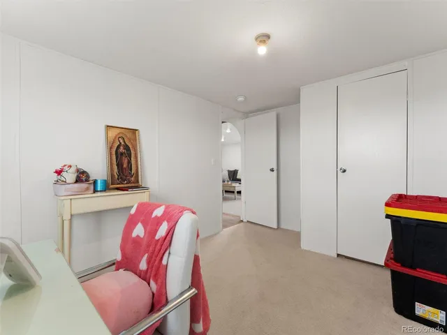 a workspace with furniture and wooden floor