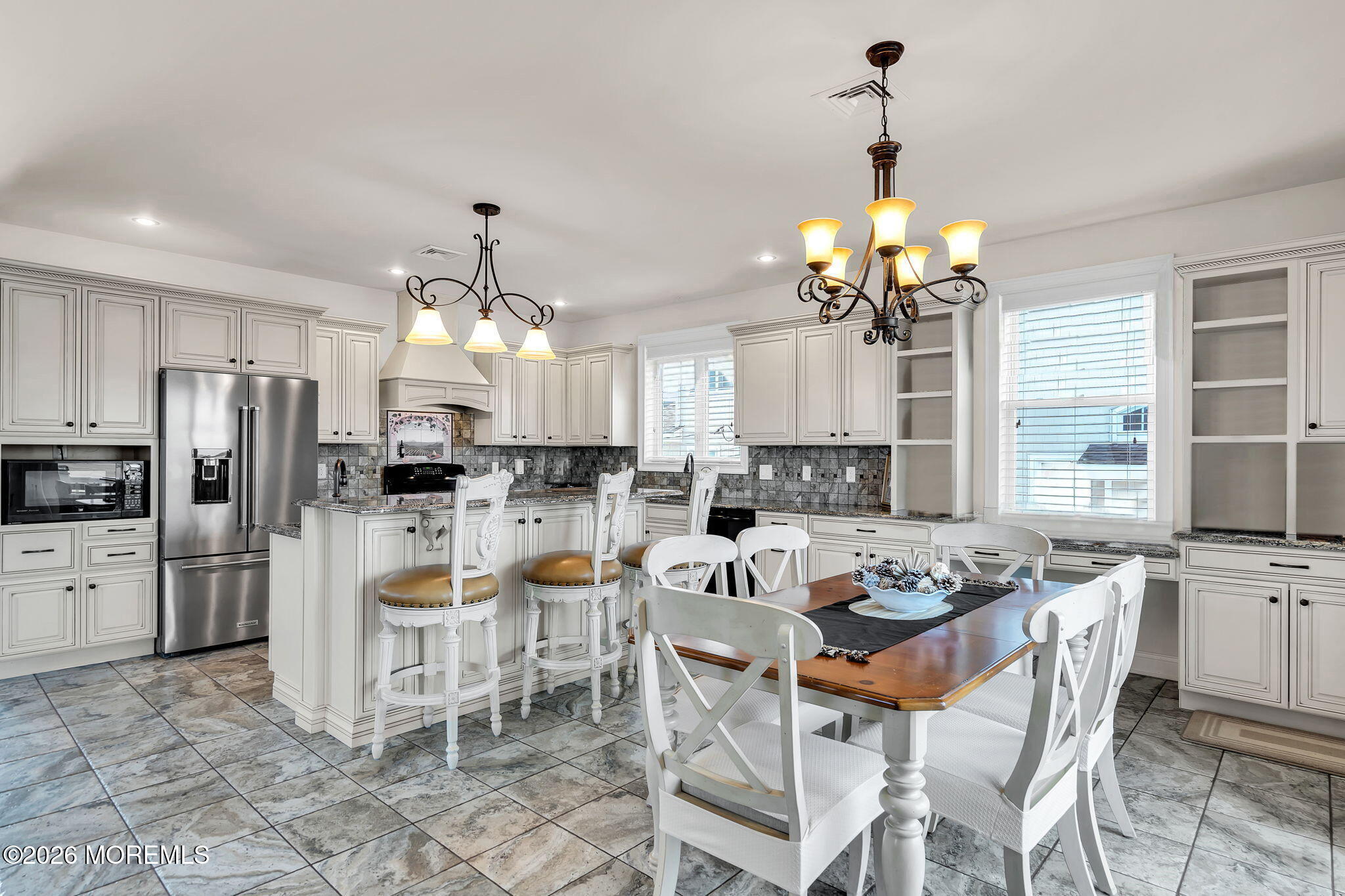 385 Kingfisher Road Tuckerton, NJ 08087 - Photo 11 of 39 a view of a dining room kitchen and a chandelier
