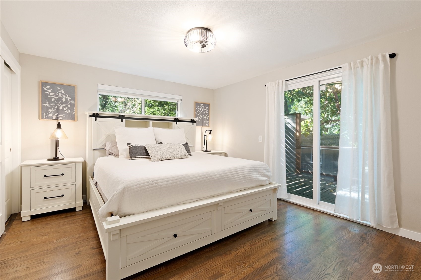 8205 208th Street Southwest Edmonds, WA 98026 - Photo 23 of 39 a bedroom with a bed and a window