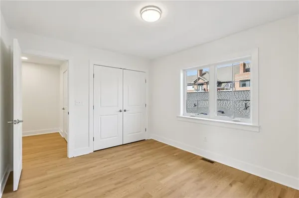 a spacious bathroom with a double vanity sink double and mirror