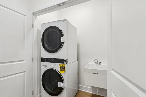 a view of an empty room with wooden walls