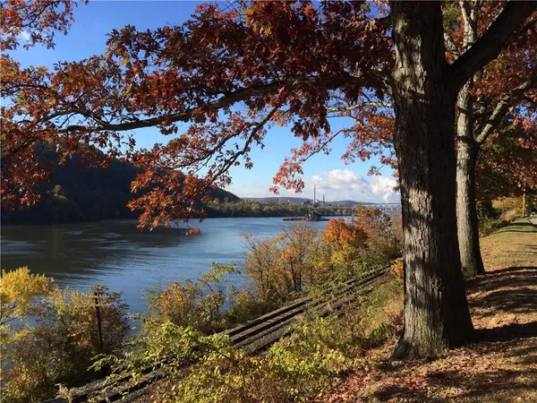 a view of a playground with basketball court