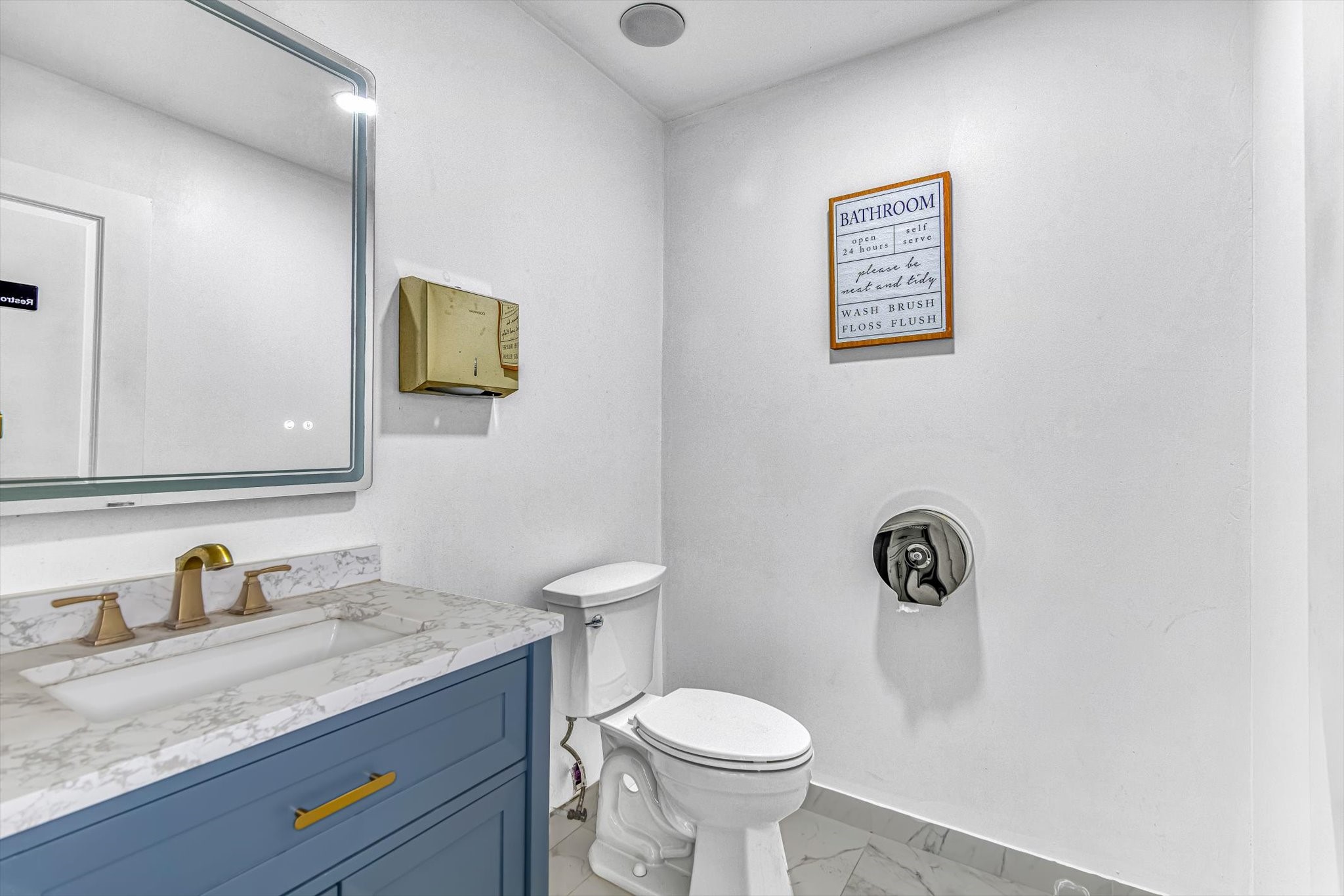 26822 Prairie Lane Katy, TX 77494 - Photo 11 of 30 a bathroom with a granite countertop toilet sink and mirror
