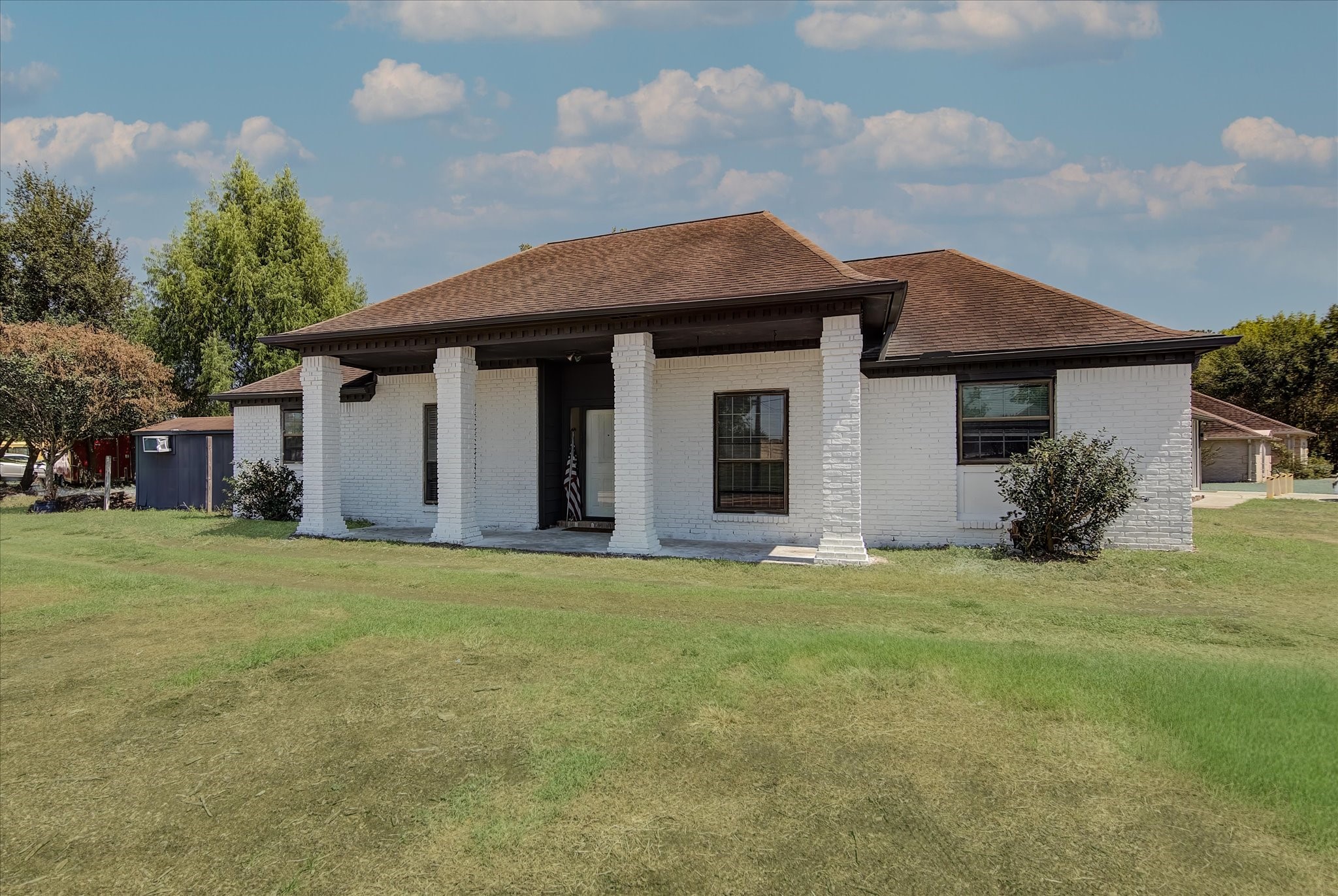 26822 Prairie Lane Katy, TX 77494 - Photo 13 of 30 a front view of a house with a garden