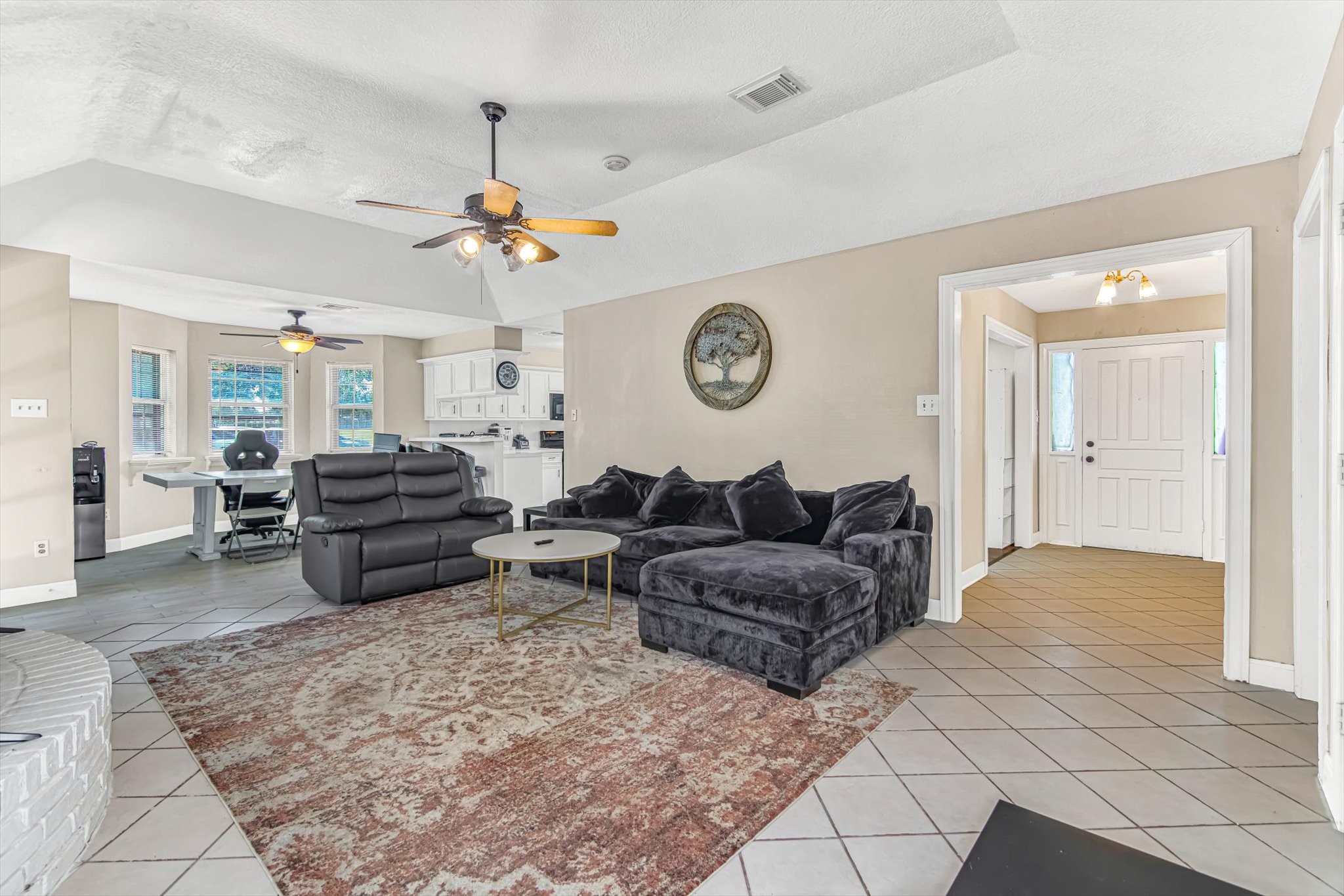26822 Prairie Lane Katy, TX 77494 - Photo 20 of 30 a living room with couch a large window and a clock