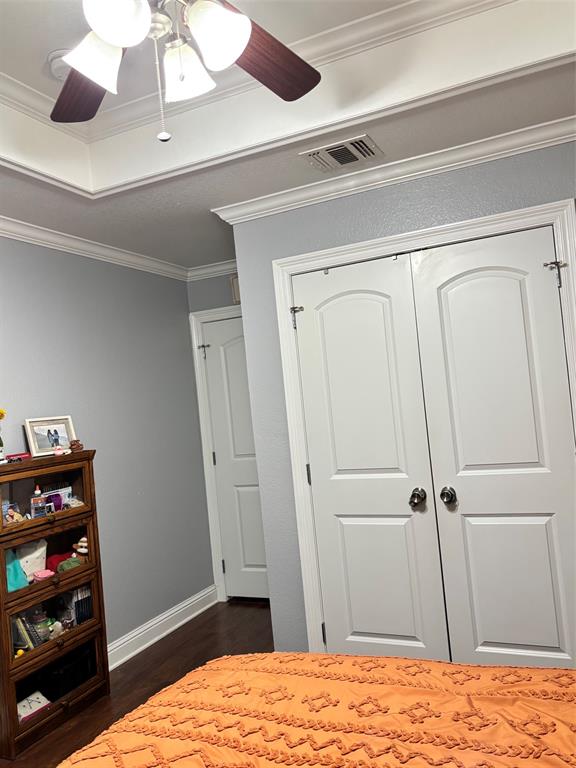 605 Jade Haughton, LA 71037 - Photo 13 of 34 Tray ceiling with crown molding and ceiling fan featuring five lights and dark wood-finish blades