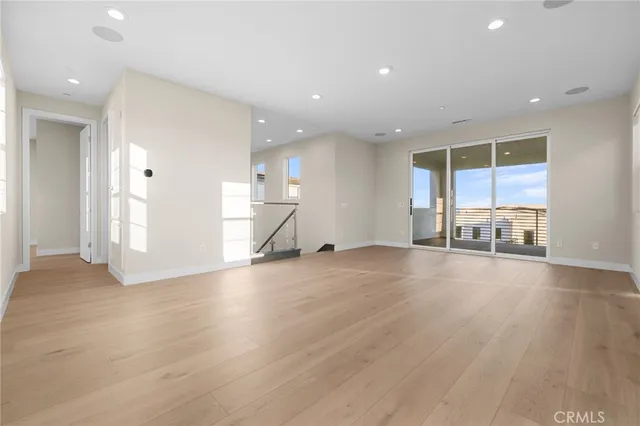 a view of a kitchen with a sink and a window