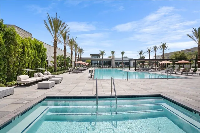 a view of swimming pool with a patio