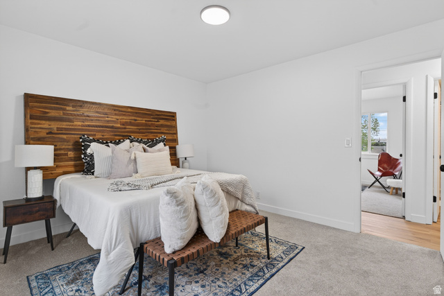 489 Owens Street Layton, UT 84041 - Photo 12 of 25 Bedroom featuring light carpet and baseboards