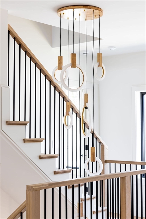 180 Wiswall Road Newton, MA 02459 - Photo 19 of 41 a view of staircase with railing and white walls